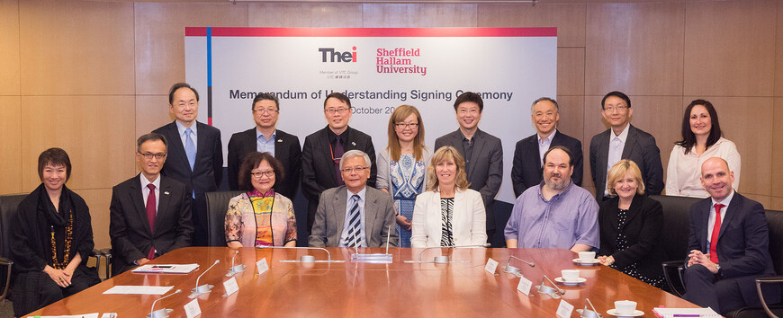 VTC Executive Director (third from left, front row) and THEi President Professor David LIM (forth from the left) posed with representatives of Sheffield Hallam University who attended the signing ceremony